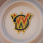 Several hands holding beer glasses